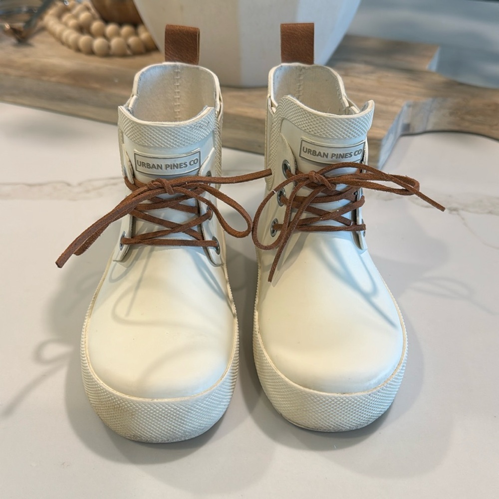 Urban Pines ivory lace up rain boots.